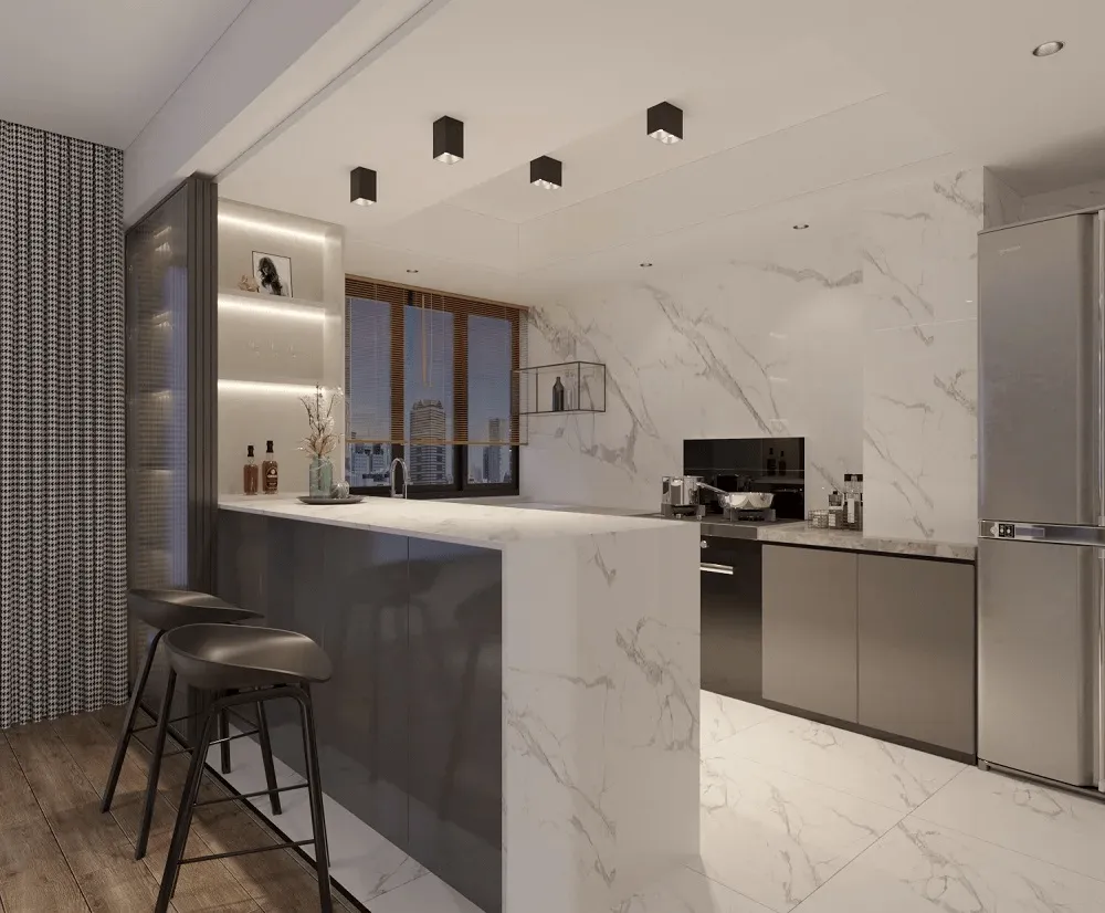 Modern kitchen interior with marble island, recessed ceiling lights, and black pendant spotlights