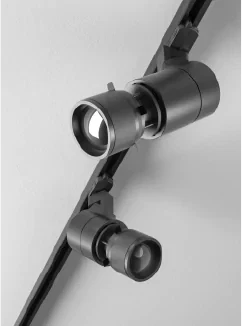 Black LED track light with adjustable spotlight heads mounted on ceiling track