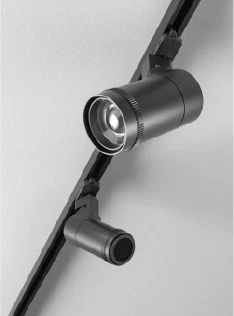 Dual black adjustable LED track spotlights mounted on ceiling rail