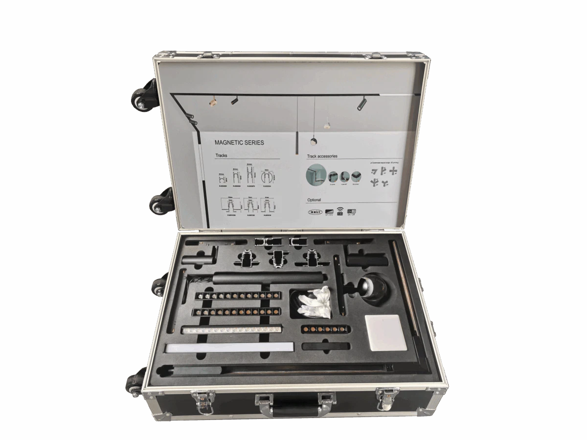 Open magnetic track lighting demo kit with tracks and accessories in carrying case